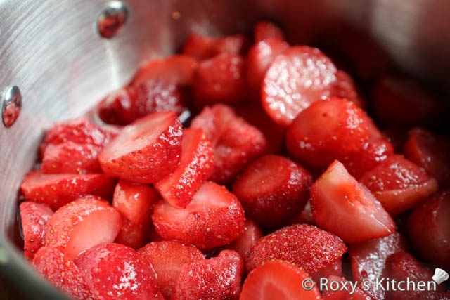 Wash and cut half of the strawberries into small pieces.