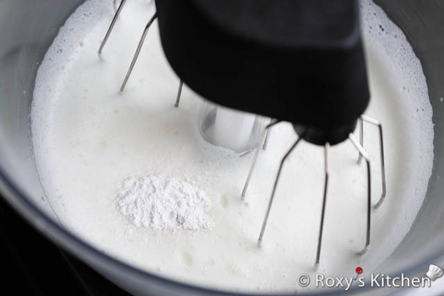 In the meantime, place your egg whites in the bowl of a stand mixer fitted with a whisk attachment.  When your strawberry syrup reaches about 220°F (105°C), start mixing your egg whites until they become foamy. 