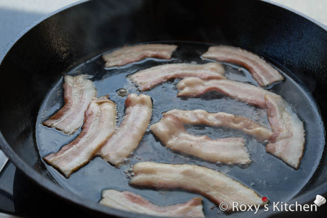 Cut the bacon slices in half and cook them over medium heat.