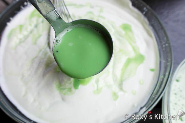 Gently mix the cooled milk and egg mixture into the whipped cream. 