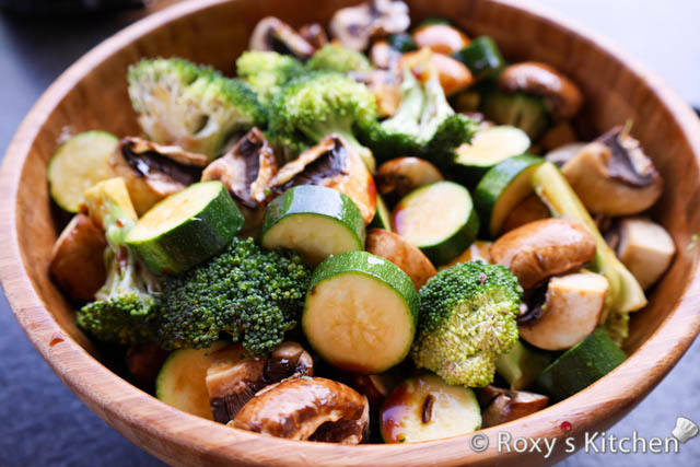 Toss the vegetables gently to distribute the oil and soy sauce evenly. 