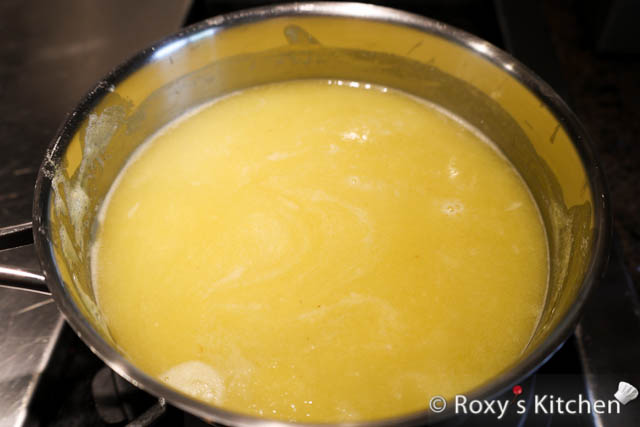 In a saucepan, combine the pineapple puree, lemon juice, sugar, and 480 ml (2 cups) of water. Heat the mixture over medium heat, stirring continuously until the sugar is completely dissolved.