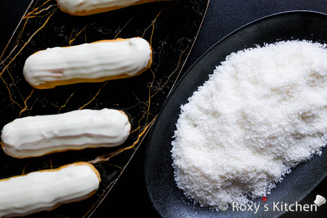 Dip your éclairs in white chocolate ganache. Let the chocolate set for 1 minute and then dip each éclair in shredded coconut. 