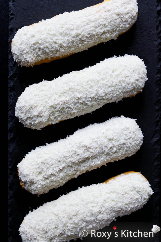 Eclairs topped with white chocolate and coconut 