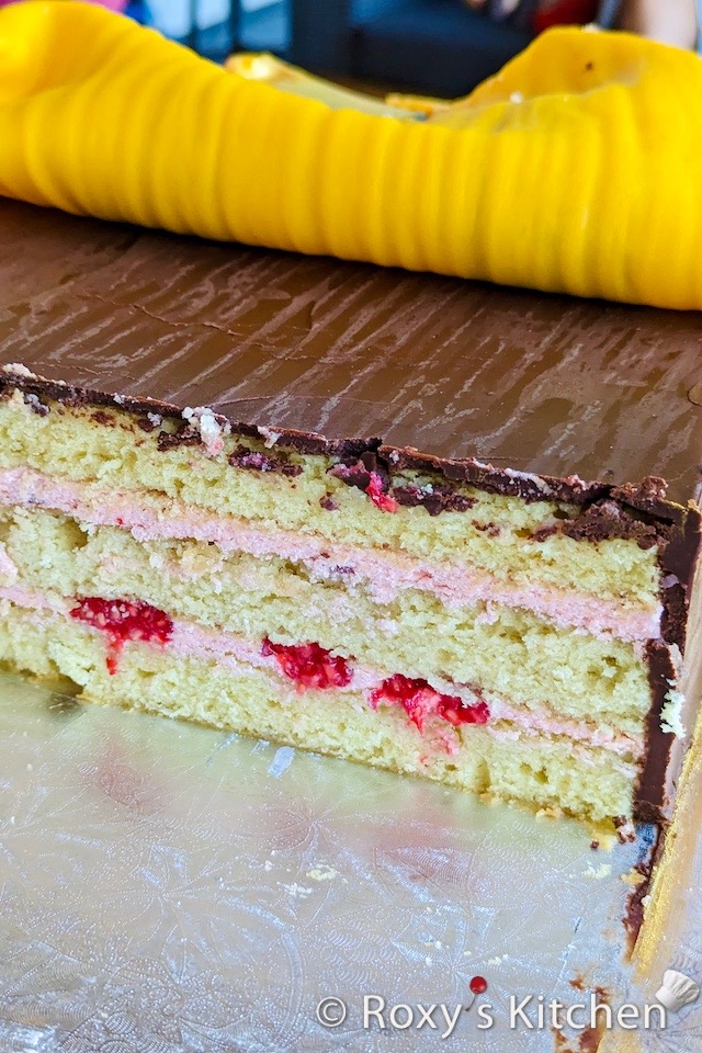 Soccer Jersey Cake - moist vanilla cake filled with raspberry cream cheese buttercream and fresh raspberries. 