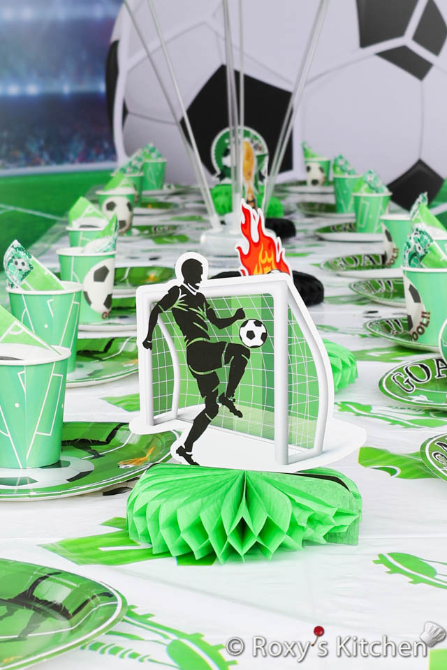 Use soccer-themed paper plates, cups and straws featuring soccer balls, jerseys, or team logos. They add a fun and festive touch to the dining area.