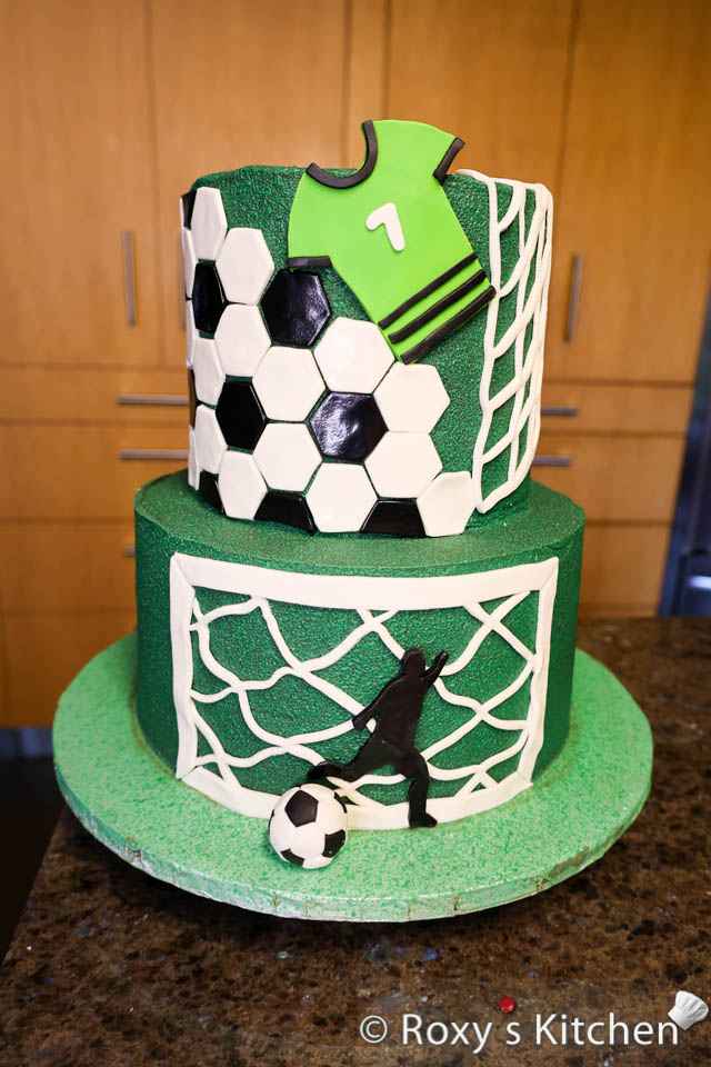 Learn how to make a Soccer-Themed Cake that's as impressive as it is delicious! It's a great for die-hard soccer fans or for a soccer-themed birthday party! 