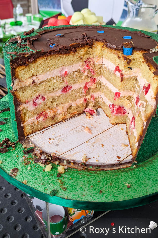 Soccer-Themed Cake - Vanilla cake filled with raspberry cream cheese buttercream and fresh raspberries