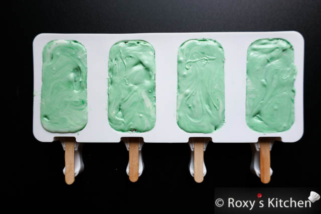Green & White Marbled Cakesicles - Lastly, follow the same steps as above to paint the silicone mold cavities, fill the molds and remove the cakesicles from the molds. 