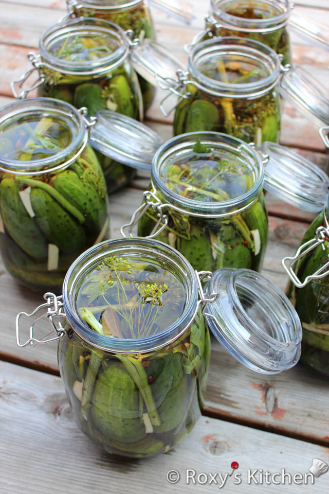 Using a funnel (if available), ladle the hot brine into each jar, covering the cucumbers completely. Leave about ½ inch of headspace at the top.