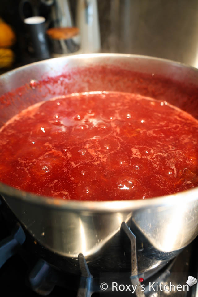 Simmer Plum Jam - If you notice any sticking at the bottom, use a stainless steel spoon to carefully mix and scrape the bottom, releasing any bits that may have adhered to the surface. This will help ensure an even consistency and prevent burning.