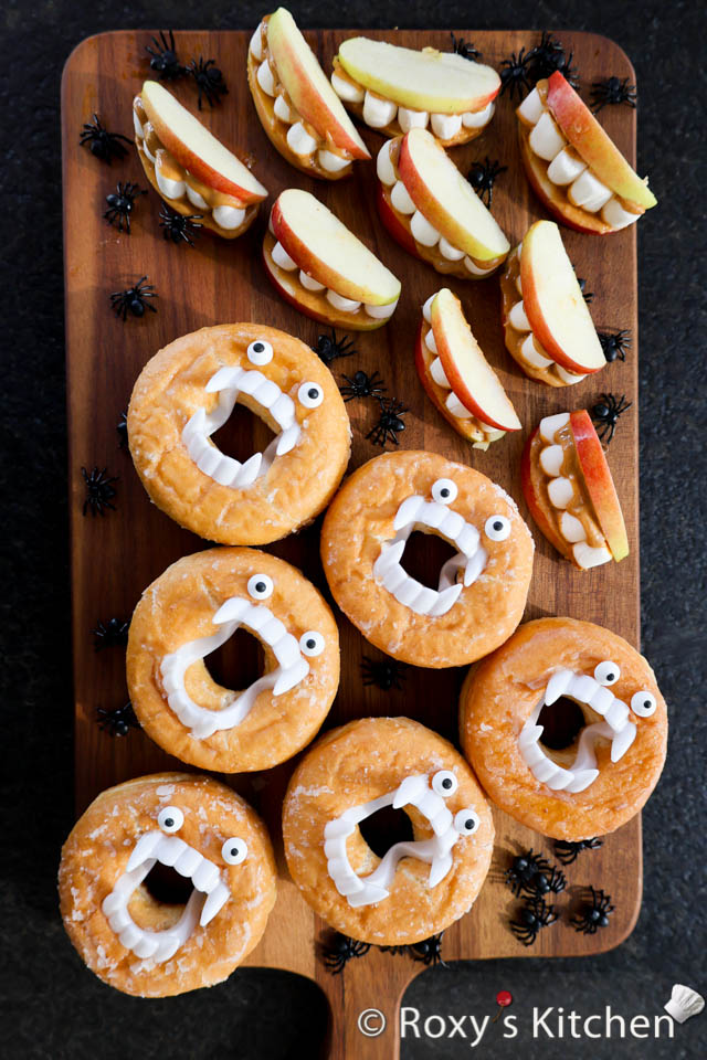 Bites on Boards: # 7 Monster Munchies - If you’re planning a Halloween party or just want to add a little spooky fun to your treats, this Monster Munchies food board is the ultimate choice. Filled with monster doughnuts, apple marshmallow teeth, and creepy-crawly decorations, it’s a hit with kids and adults alike. 