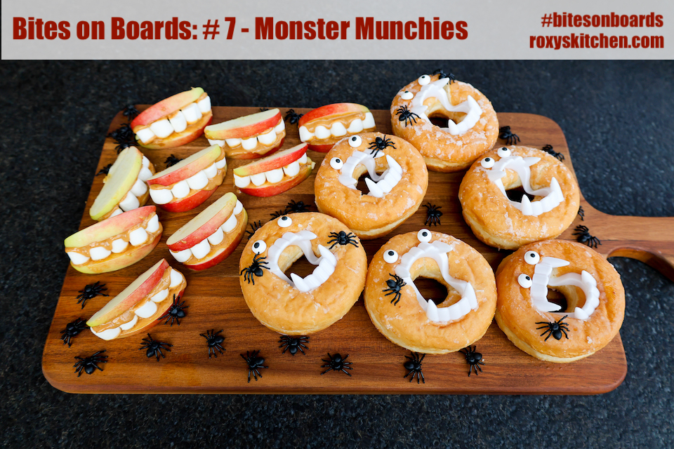 Bites on Boards: # 7 Monster Munchies - If you’re planning a Halloween party or just want to add a little spooky fun to your treats, this Monster Munchies food board is the ultimate choice. Filled with monster doughnuts, apple marshmallow teeth, and creepy-crawly decorations, it’s a hit with kids and adults alike. 