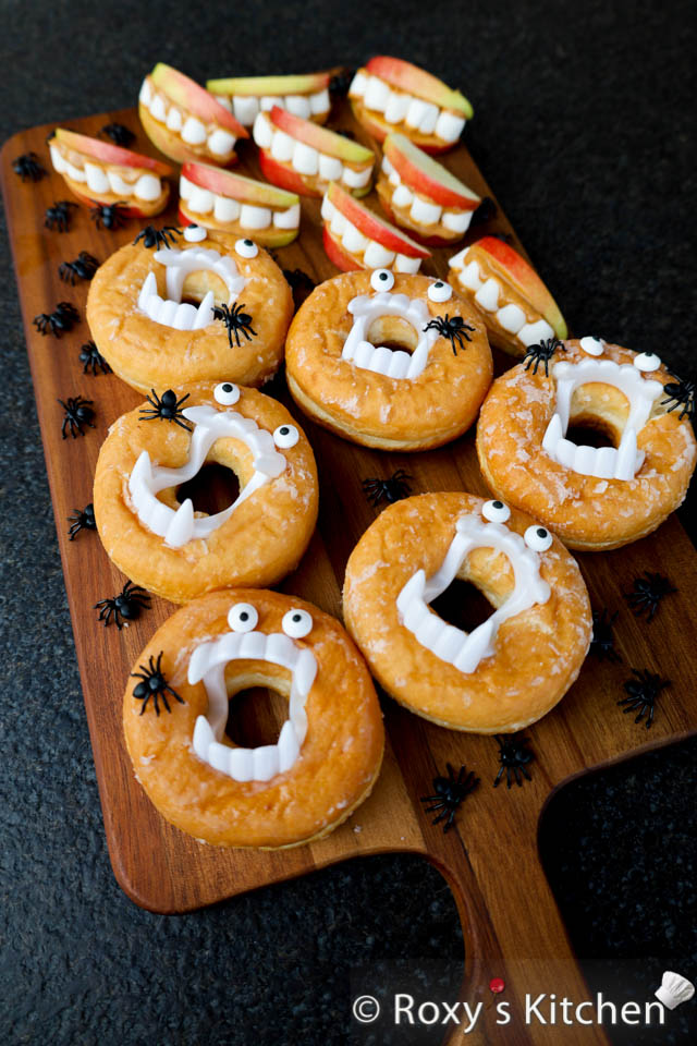 Bites on Boards: # 7 Monster Munchies - If you’re planning a Halloween party or just want to add a little spooky fun to your treats, this Monster Munchies food board is the ultimate choice. Filled with monster doughnuts, apple marshmallow teeth, and creepy-crawly decorations, it’s a hit with kids and adults alike. 