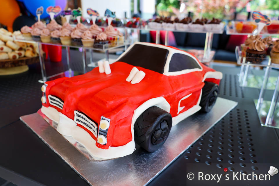 How to Make a Race Car Cake - Tutorial with 50+ Photos & Videos. My kids are Rocket League fans so this year I threw race car-themed birthday parties for them. I made them two race car cakes to go along with the theme, cupcakes, race car-themed cakesicles and other desserts.